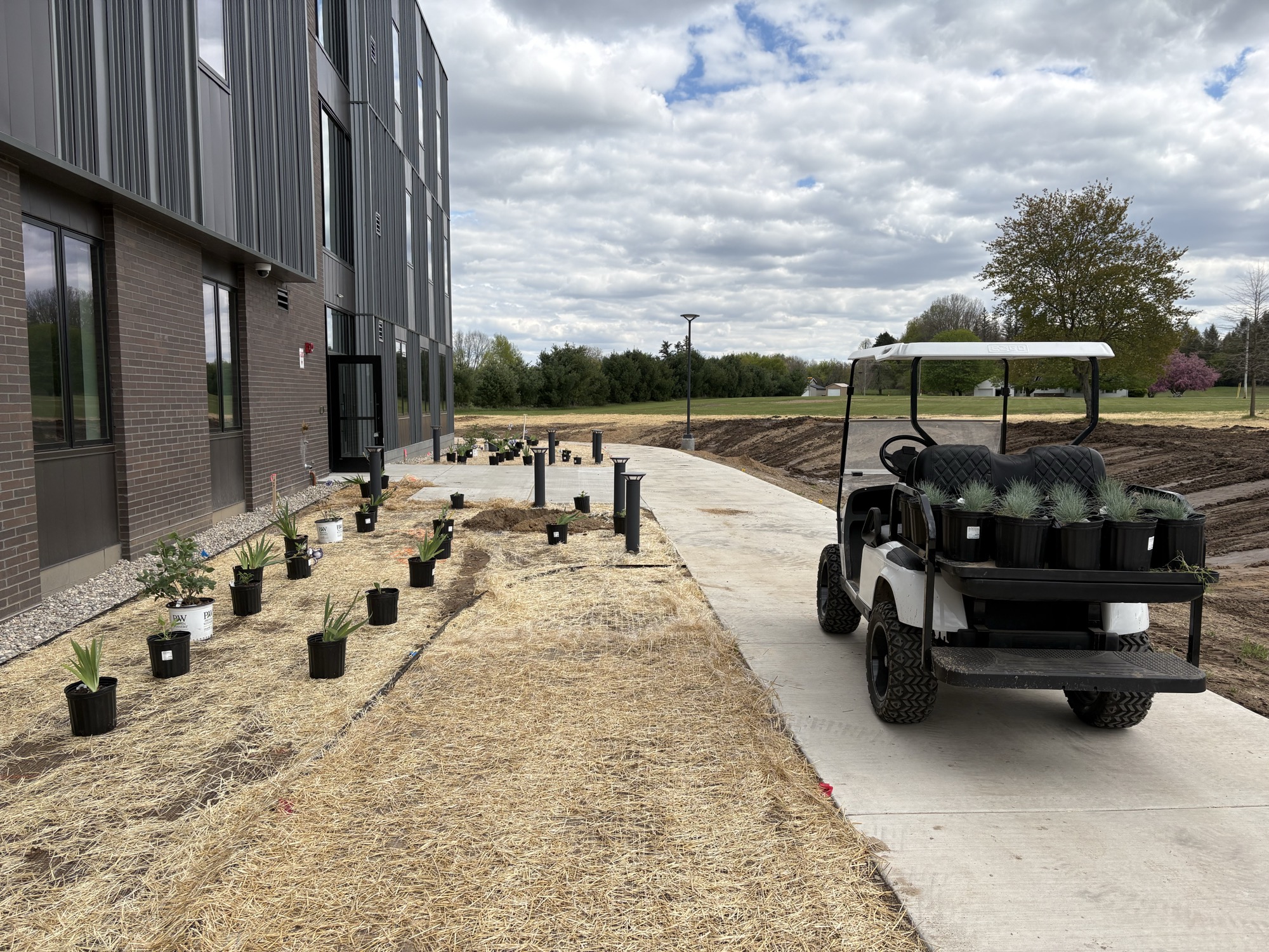 North Shade Lawn crew planting beds at a commercial property