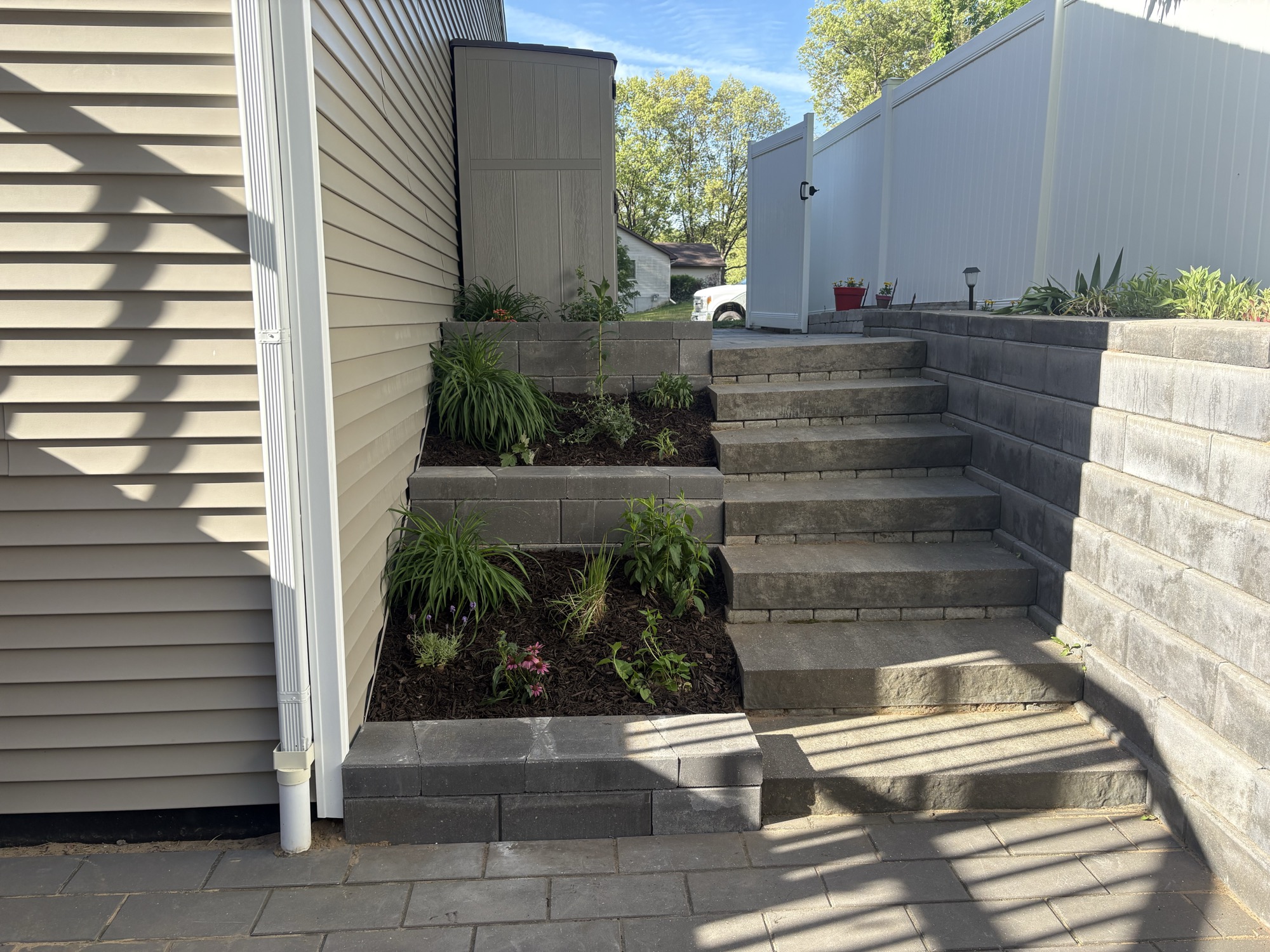 Stone home with hardscaping