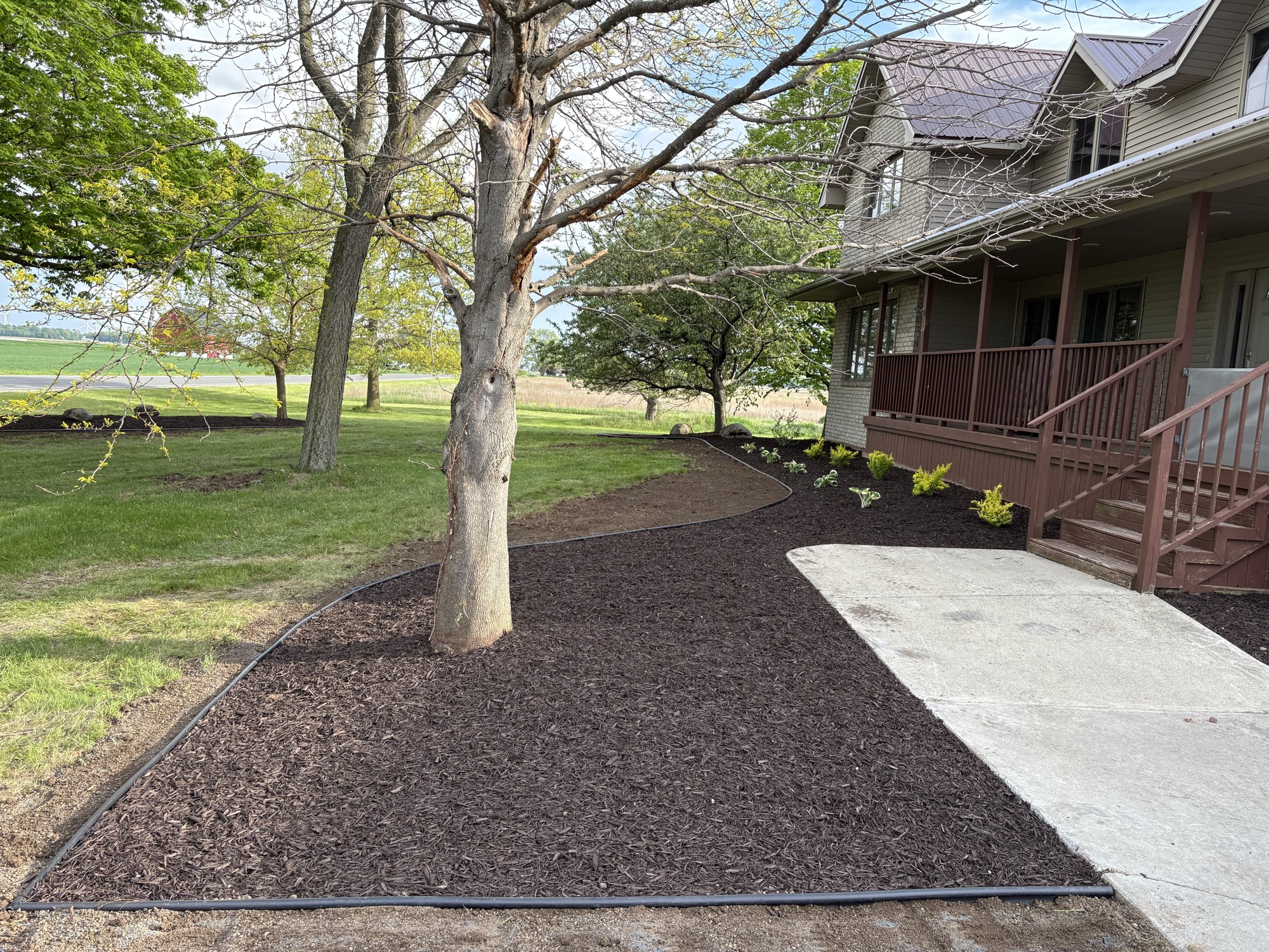 Mulching project by North Shade Lawn